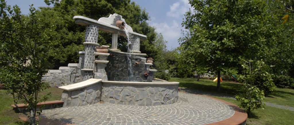 Stunning brunette beauty posing over urban background